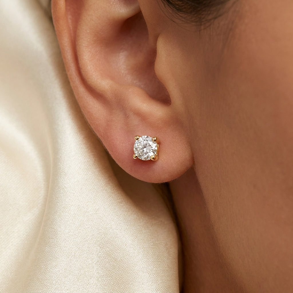 ESSENTIEL Ohrring und 0.5 Karat in Gelbgold 585