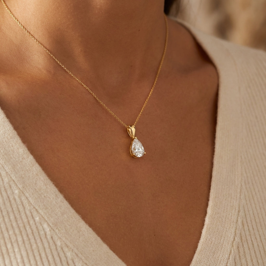 POIRE Anhänger und 0.5 Karat in Gelbgold 585