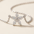 FLEUR Halskette und 0.5 Karat in Weißgold 585