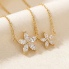 FLEUR Halskette und 0.3 Karat in Gelbgold 585