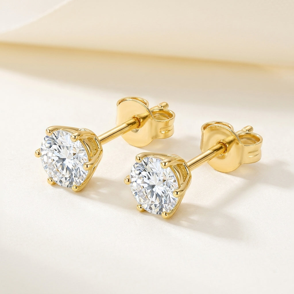 CLASSIQUE Ohrring und 0.5 Karat in Gelbgold 585